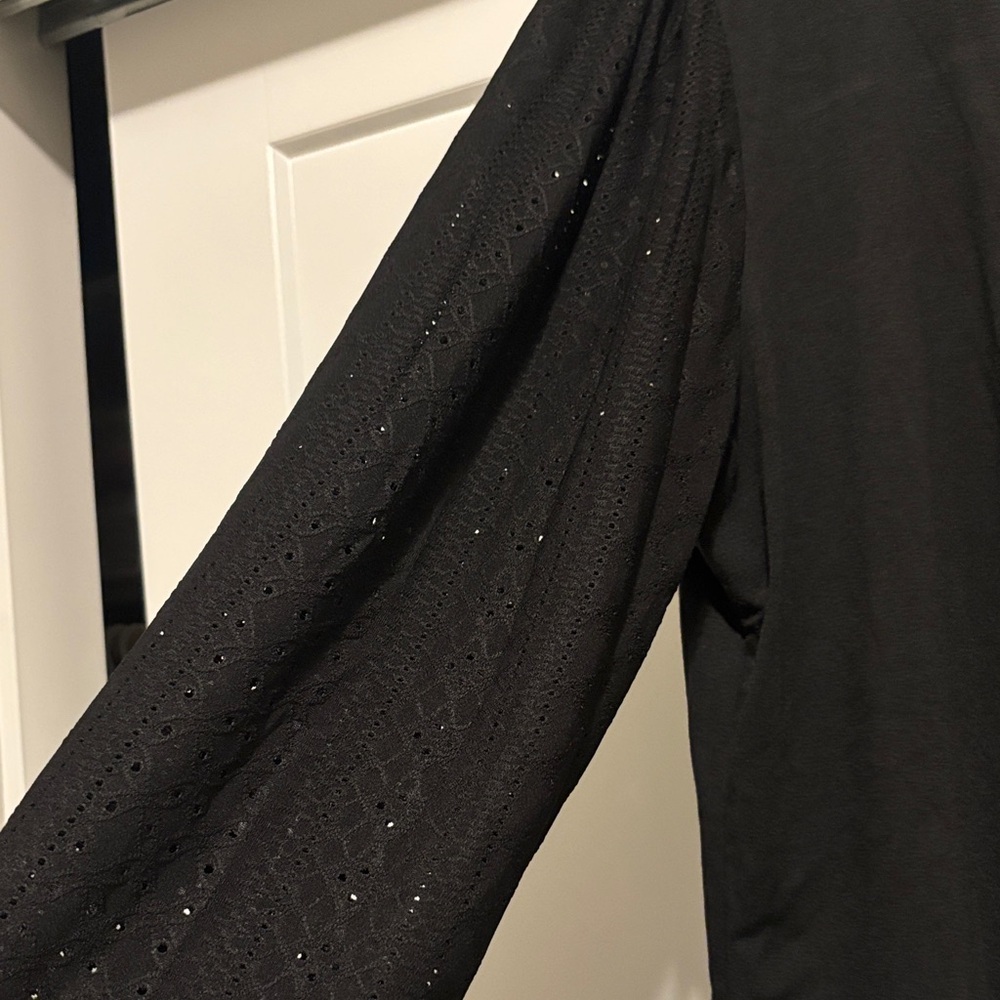 Black Long Sleeve Women's Top sleeves have small cutouts NWT